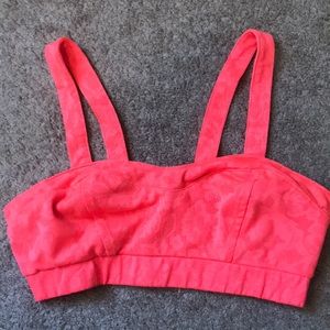 Coral colored cross patter bra